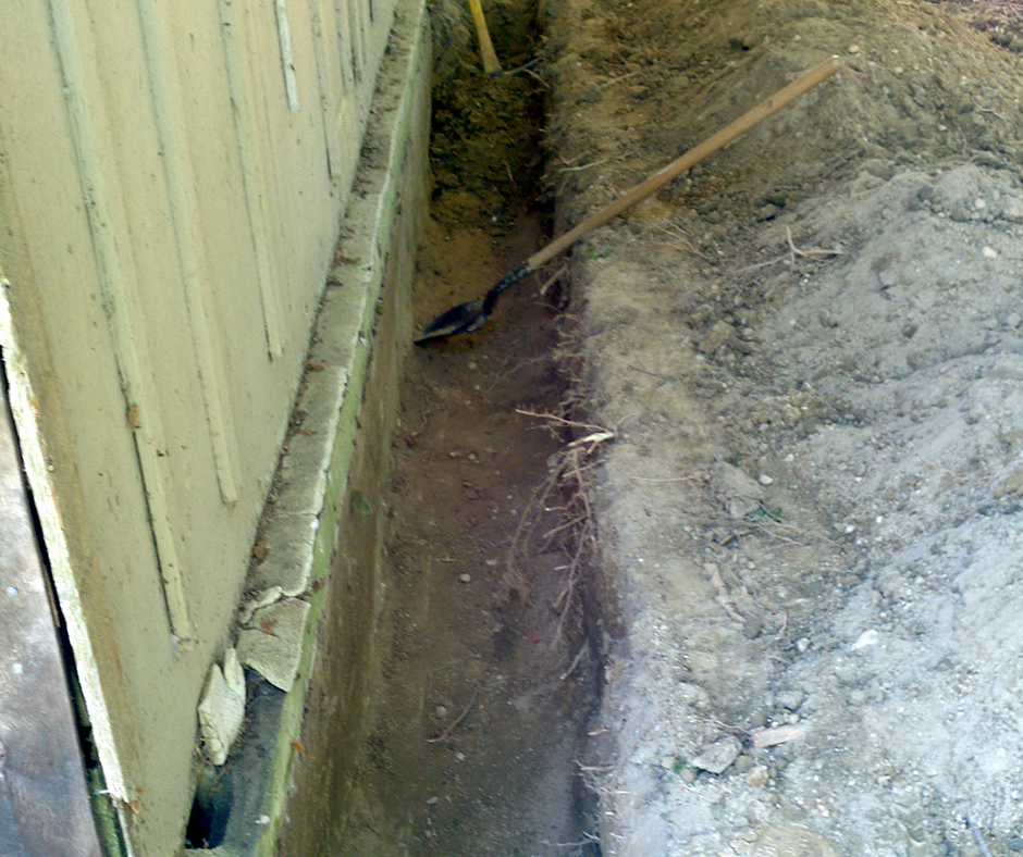 Narrow Trench Dug for French Drain Installation, Philadelphia Narrow Trench Dug for French Drain Installation, Philadelphia